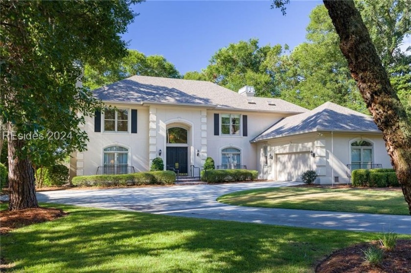 Discover this beautifully maintained 4-bedroom, 4 full and 1 - Beach Home for sale in Hilton Head Island, South Carolina on Beachhouse.com