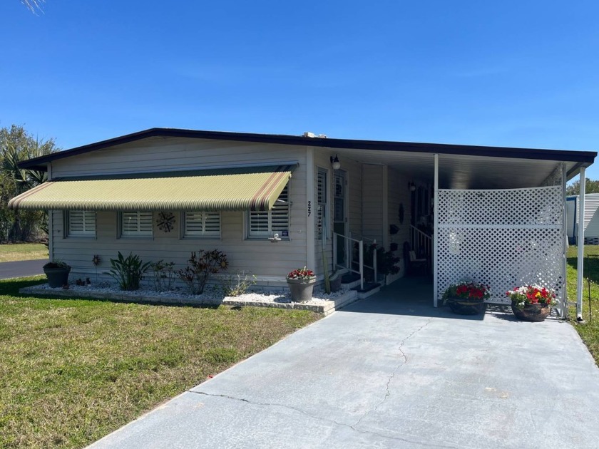 This fully furnished 2 Bed/2 Bath on a corner lot offers a sense - Beach Home for sale in Largo, Florida on Beachhouse.com