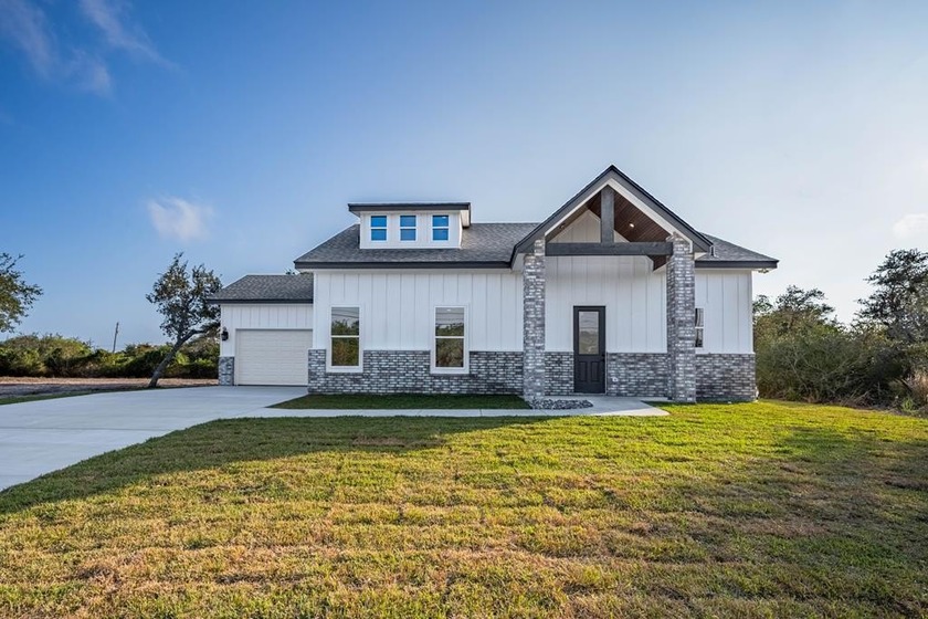 Experience coastal living at its finest in this brand-new 3 - Beach Home for sale in Rockport, Texas on Beachhouse.com