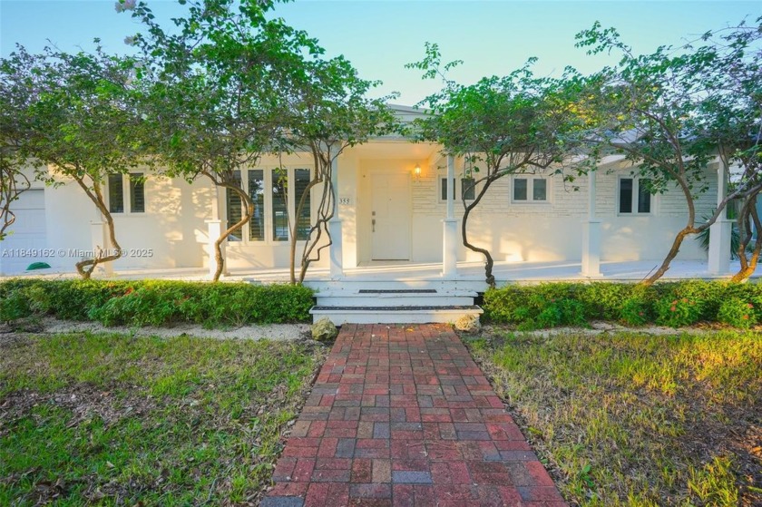 Situated on one of Key Biscayne's most coveted streets, this 7 - Beach Home for sale in Key Biscayne, Florida on Beachhouse.com