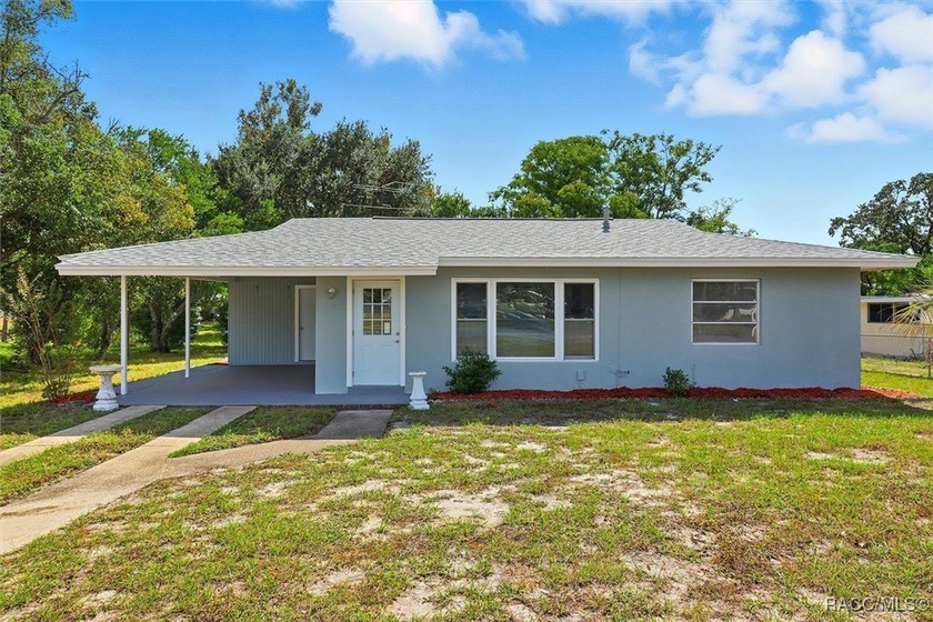 Welcome Home! This delightful 2-bedroom, 1.5-bathroom concrete - Beach Home for sale in Spring Hill, Florida on Beachhouse.com