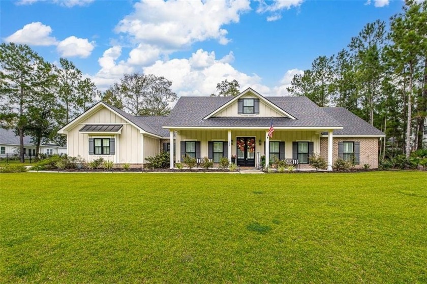 This stunning 2,539 sq ft home offers 4 spacious bedrooms and 2 - Beach Home for sale in Brunswick, Georgia on Beachhouse.com