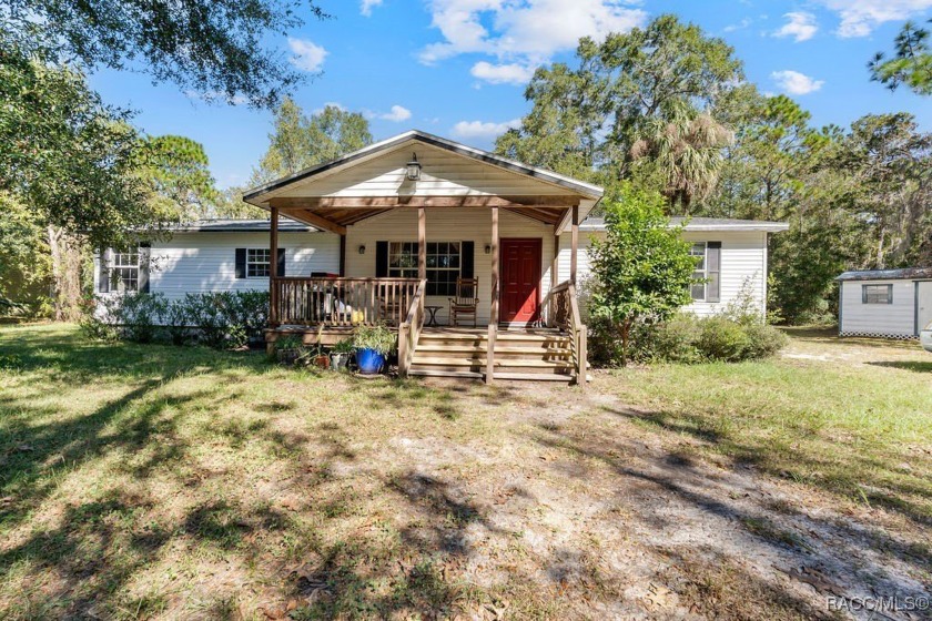 Welcome to this 3-bedroom, 2-bath home offering 1,512 square - Beach Home for sale in Inglis, Florida on Beachhouse.com
