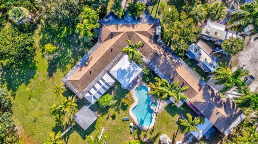 THE HOME IS HUGE BUT THE 3.31 ACRES SURROUNDING IT WITH 70' TALL - Beach Home for sale in West Palm Beach, Florida on Beachhouse.com