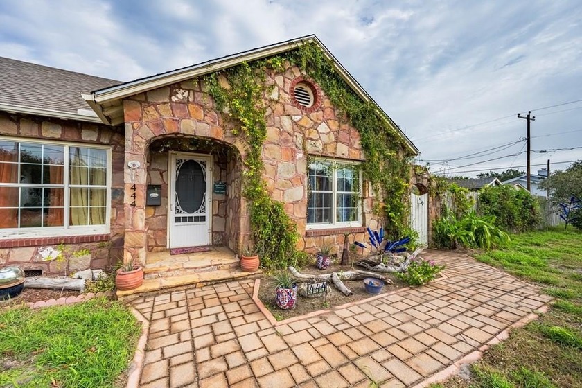This enchanted stone cottage is one not to be missed!  2-bedroom - Beach Home for sale in Aransas Pass, Texas on Beachhouse.com