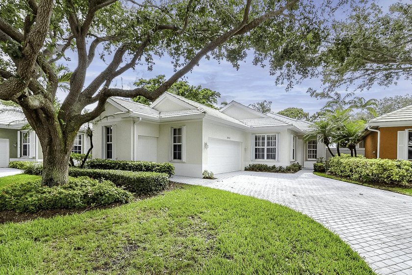 Stylish new listing in Monarch Country Club is flooded w/natural - Beach Home for sale in Palm City, Florida on Beachhouse.com