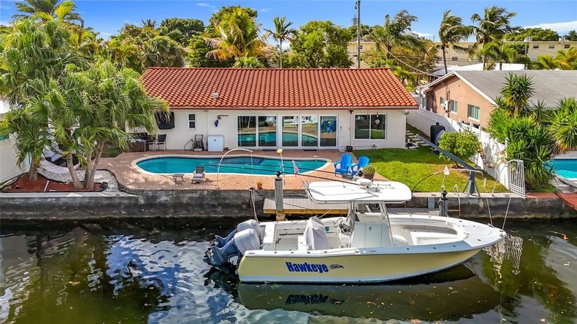 Wake up to your boat in your backyard! This stunning canal-front - Beach Home for sale in Pompano Beach, Florida on Beachhouse.com