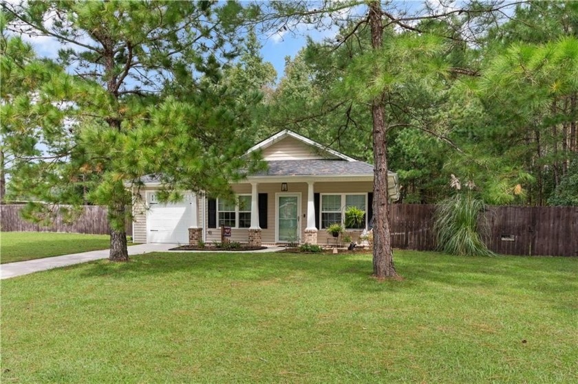 This cute cottage has both charm and practicality! Enter the - Beach Home for sale in Townsend, Georgia on Beachhouse.com