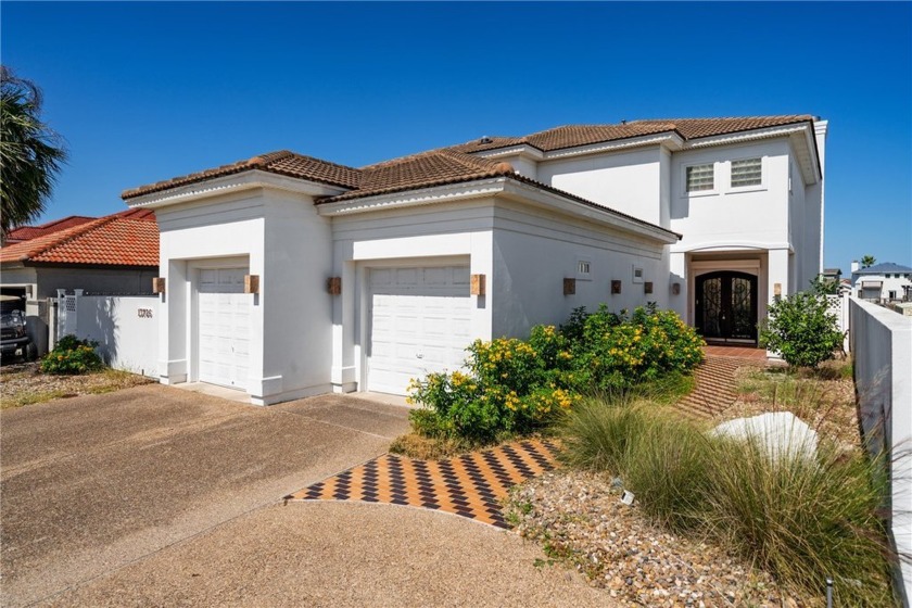 Welcome to this stunning waterfront home located almost at the - Beach Home for sale in Corpus Christi, Texas on Beachhouse.com