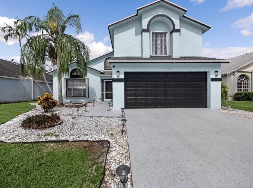 Luxurious 3-Bedroom + Den Home with Spa-Style Amenities & Lake - Beach Home for sale in Greenacres, Florida on Beachhouse.com