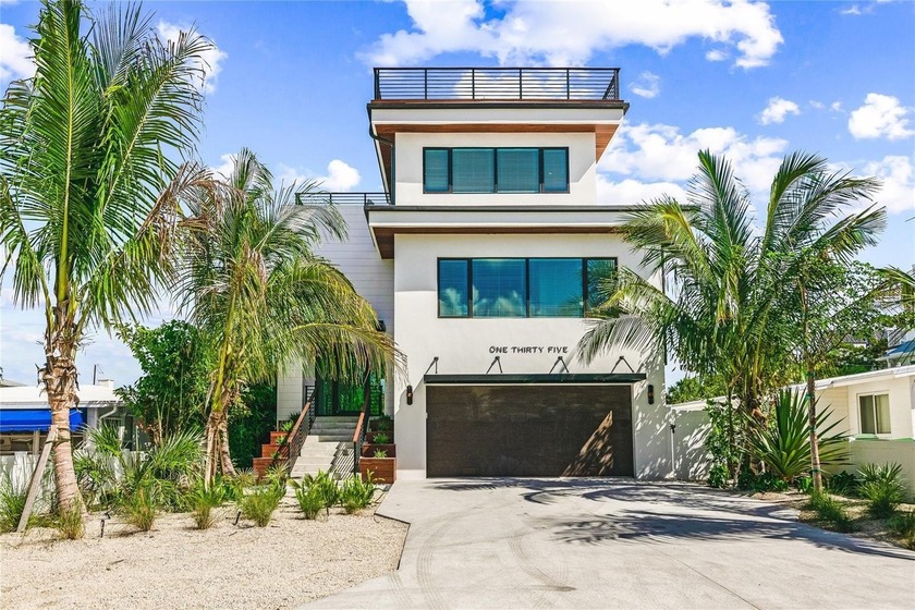 Welcome to your dream home on Lido Key! This impressive 3-story - Beach Home for sale in Sarasota, Florida on Beachhouse.com