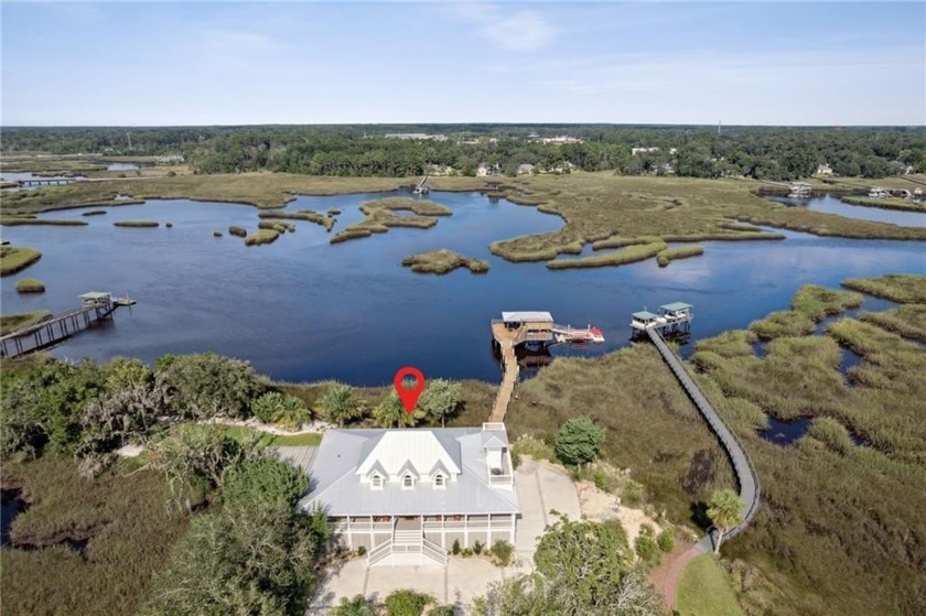 Experience luxury living at its finest in this breathtaking St - Beach Home for sale in Saint Marys, Georgia on Beachhouse.com