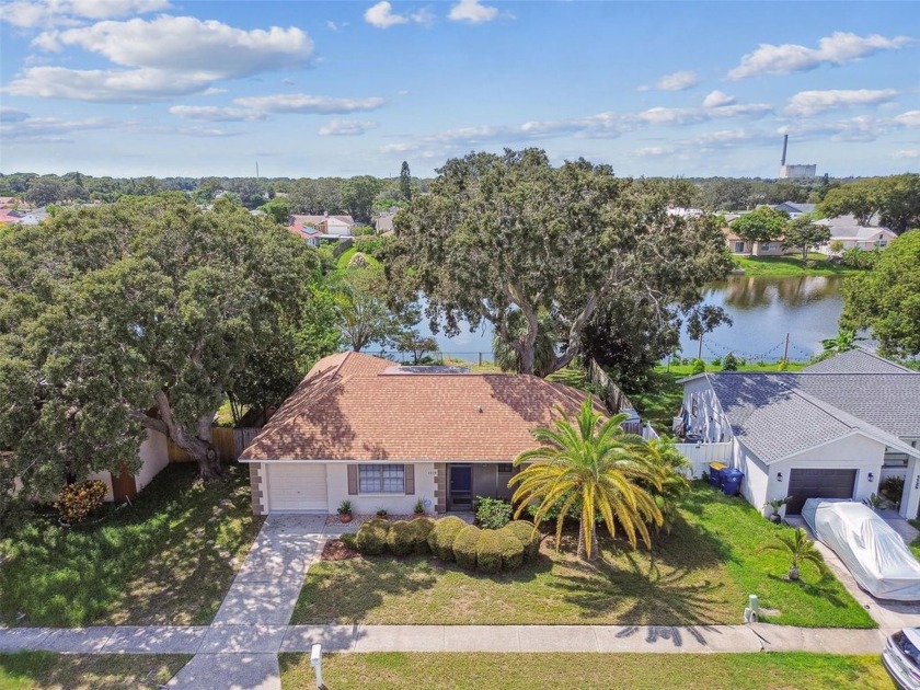 Well maintained, lake view home in Holiday Lakes West.  Near - Beach Home for sale in Holiday, Florida on Beachhouse.com