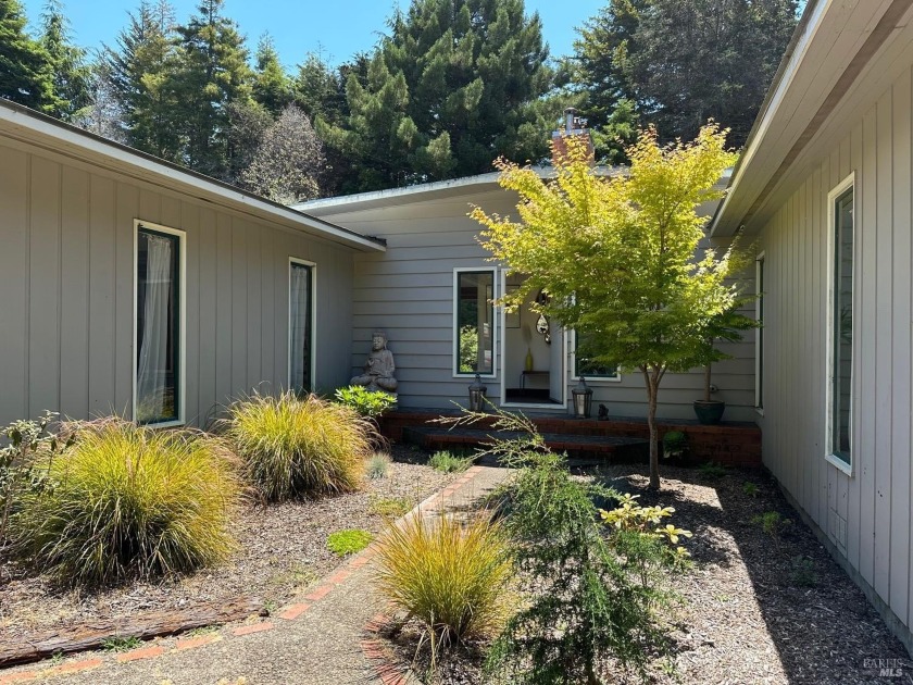 Step into this enchanting residence and be captivated by its - Beach Home for sale in Mendocino, California on Beachhouse.com