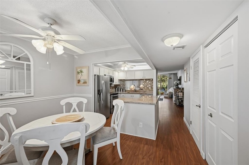 As you enter, you are greeted with modern comfort and coastal - Beach Condo for sale in Pompano Beach, Florida on Beachhouse.com