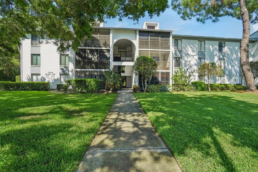 Welcome to Pine Ridge at Lake Tarpon Village! This charming - Beach Condo for sale in Tarpon Springs, Florida on Beachhouse.com