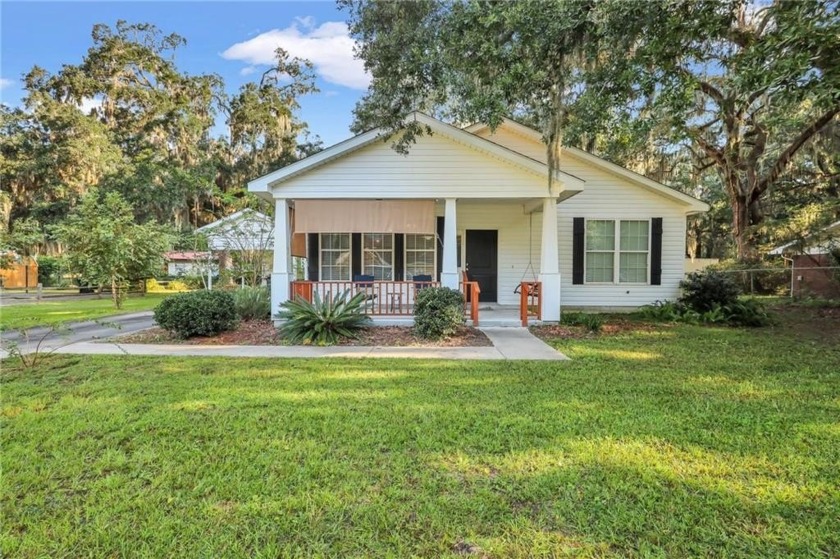 Charming and inviting, this delightful home boasts high ceilings - Beach Home for sale in Brunswick, Georgia on Beachhouse.com