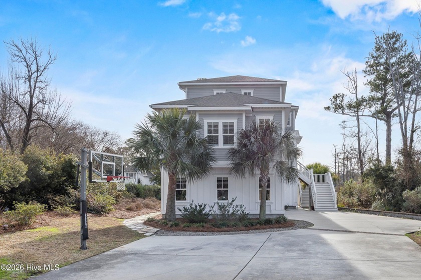 This stunning 3-story waterfront home offers over 4,700 square - Beach Home for sale in Wilmington, North Carolina on Beachhouse.com