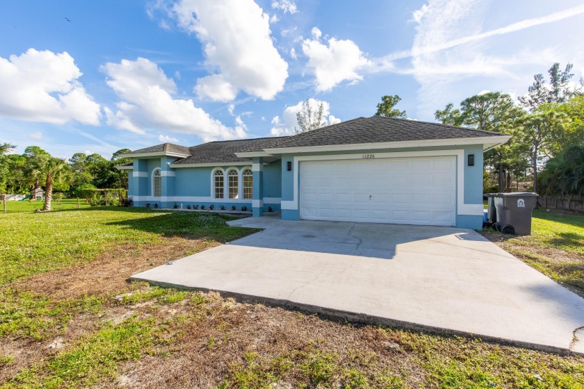 Updated 3Bed- 2 Bath single-family home in 1.25 acres in the - Beach Home for sale in Atlantis, Florida on Beachhouse.com