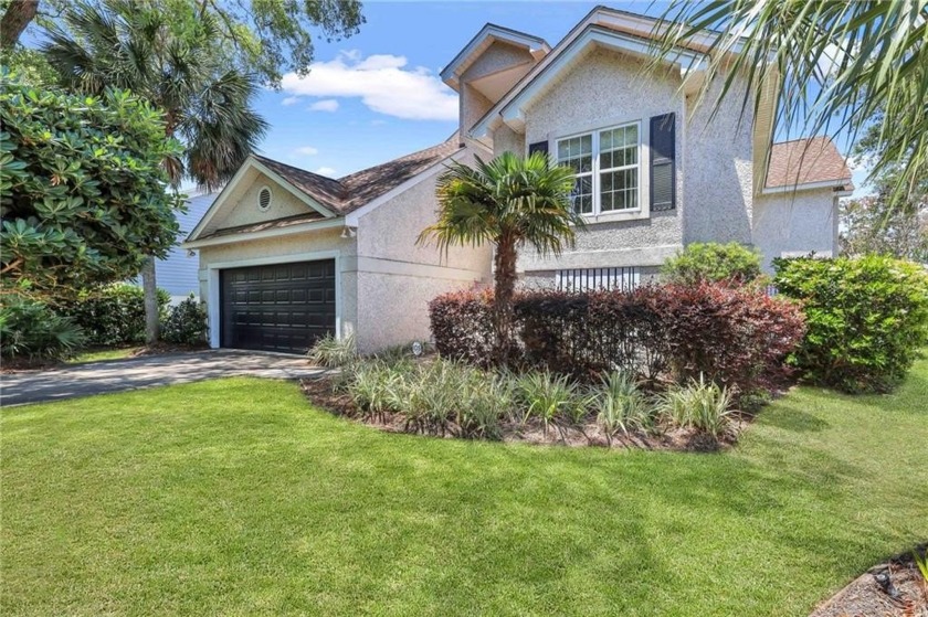 Enjoy beautiful sunsets and marsh views from the back porch - Beach Home for sale in Saint Simons, Georgia on Beachhouse.com