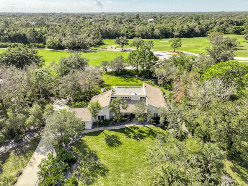 Welcome to this luxurious Crane Creek residence located within - Beach Home for sale in Palm City, Florida on Beachhouse.com