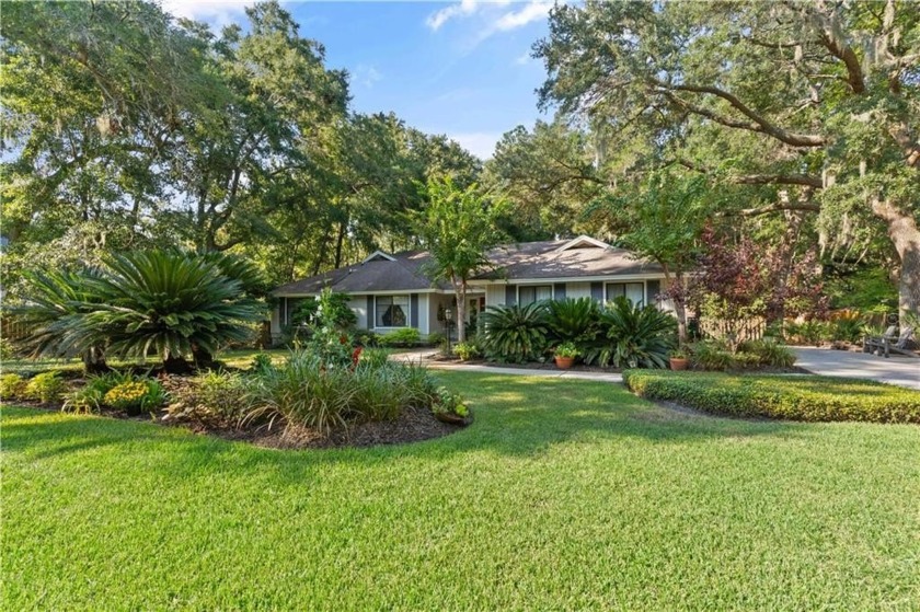 Welcome to 312 Dunbarton Drive, a charming 3-bedroom, 3 - Beach Home for sale in Saint Simons, Georgia on Beachhouse.com