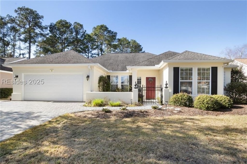 A beautiful new paver driveway and walkway lead to the - Beach Home for sale in Bluffton, South Carolina on Beachhouse.com