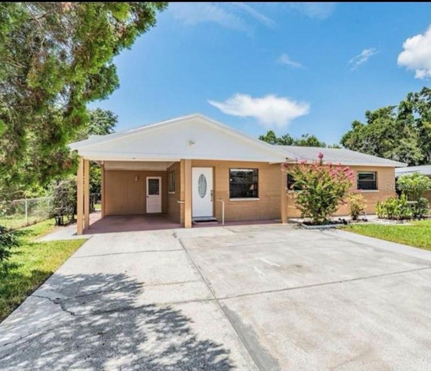 Welcome to this great 3/1 FAMILY HOME with a convenient DETACHED - Beach Home for sale in Tampa, Florida on Beachhouse.com