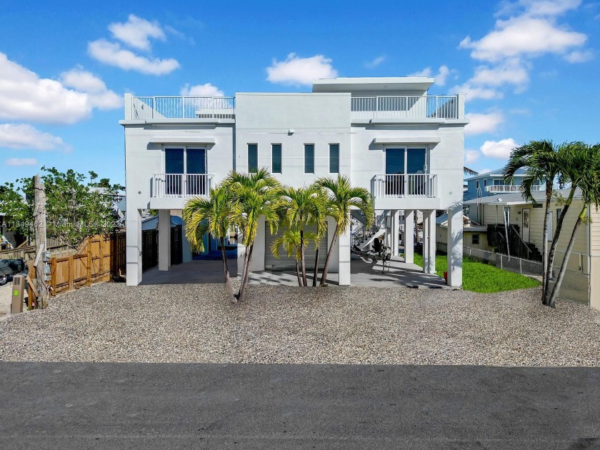 Enjoy Island Living with this New Construction 3-story dream - Beach Home for sale in Key Largo, Florida on Beachhouse.com