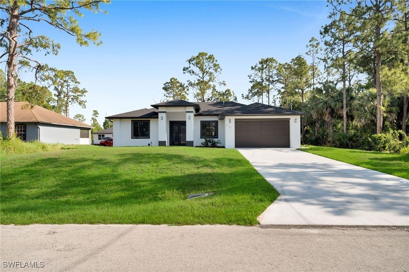 Welcome to your new home! This 3 Bedroom, 3 Bathroom, 2-Car - Beach Home for sale in Lehigh Acres, Florida on Beachhouse.com