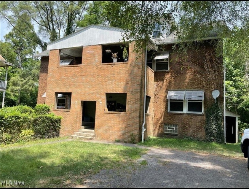 This all-brick 4-unit building features 1-bedroom, 1-bath - Beach Home for sale in Cleveland, Ohio on Beachhouse.com