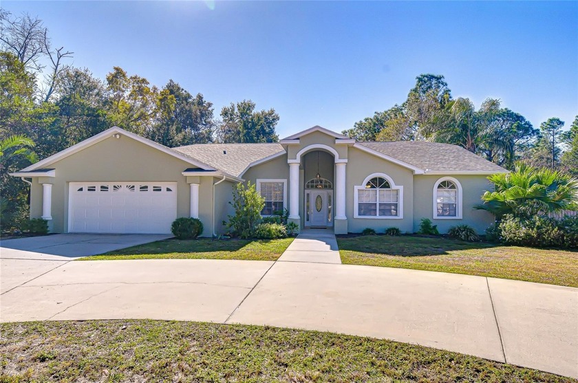 Stunningly updated four bedroom/ two bath home nestled on 1.1 - Beach Home for sale in Hudson, Florida on Beachhouse.com