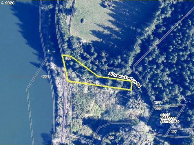 Tucked away in a peaceful, tree-filled setting, this 0.75-acre - Beach Lot for sale in Westlake, Oregon on Beachhouse.com