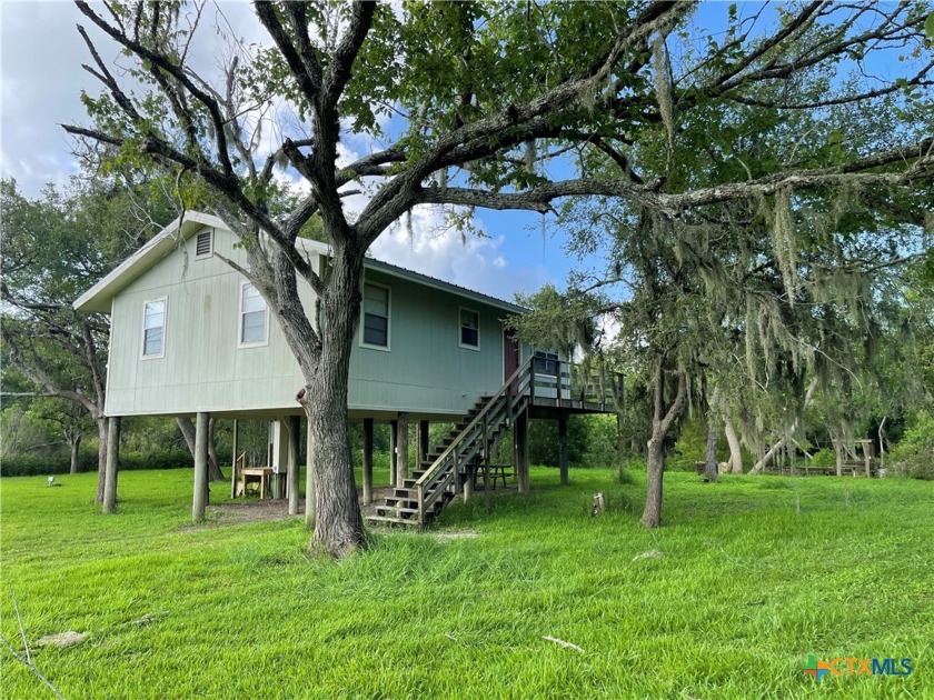 This FULLY furnished 864 sq foot home on stilts is water front - Beach Home for sale in Tivoli, Texas on Beachhouse.com