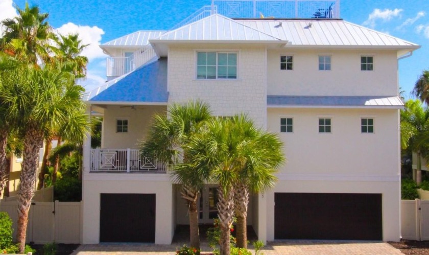 COASTAL LUXURY AWAITS IN THIS 6 BEDROOM 5.5 BATH POOL HOME WITH - Beach Home for sale in Bradenton Beach, Florida on Beachhouse.com