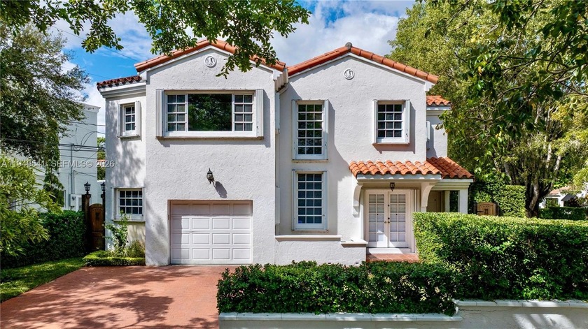 This stunning two-story, corner-lot home offers an unbeatable - Beach Home for sale in Coral Gables, Florida on Beachhouse.com