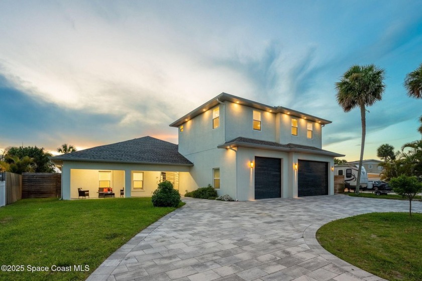 Experience waterfront living in this 2023 custom-built 5-bedroom - Beach Home for sale in Cocoa Beach, Florida on Beachhouse.com