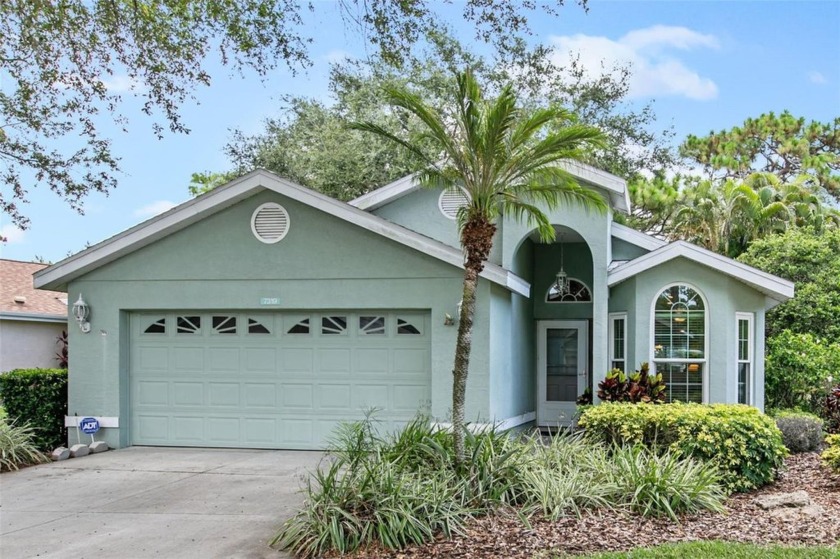 Discover tranquil living with a water view in Pinehurst Village! - Beach Home for sale in Sarasota, Florida on Beachhouse.com