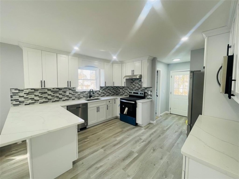 Situated on a sprawling half acre in the heart of Mastic Beach - Beach Home for sale in Mastic Beach, New York on Beachhouse.com