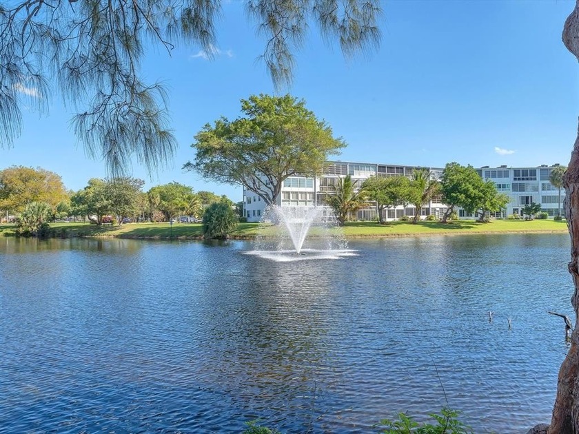 Bright second floor corner unit with expansive lake views and - Beach Condo for sale in Deerfield Beach, Florida on Beachhouse.com