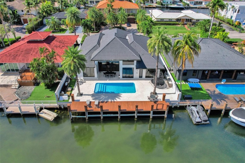 Live the POSCH life in this highly coveted, guard gated Eastern - Beach Home for sale in North Miami Beach, Florida on Beachhouse.com