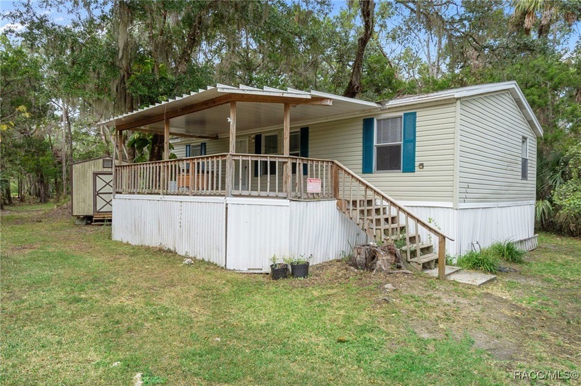 Enjoy peaceful living in this 3-bedroom, 2-bathroom home - Beach Home for sale in Homosassa, Florida on Beachhouse.com