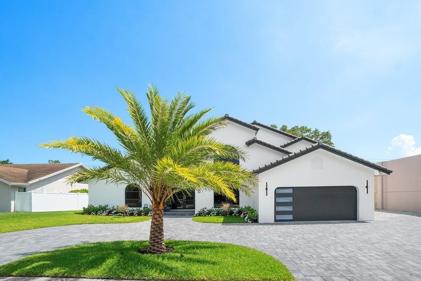 Located in the highly desirable Palm Beach Farms neighborhood & - Beach Home for sale in Boca Raton, Florida on Beachhouse.com