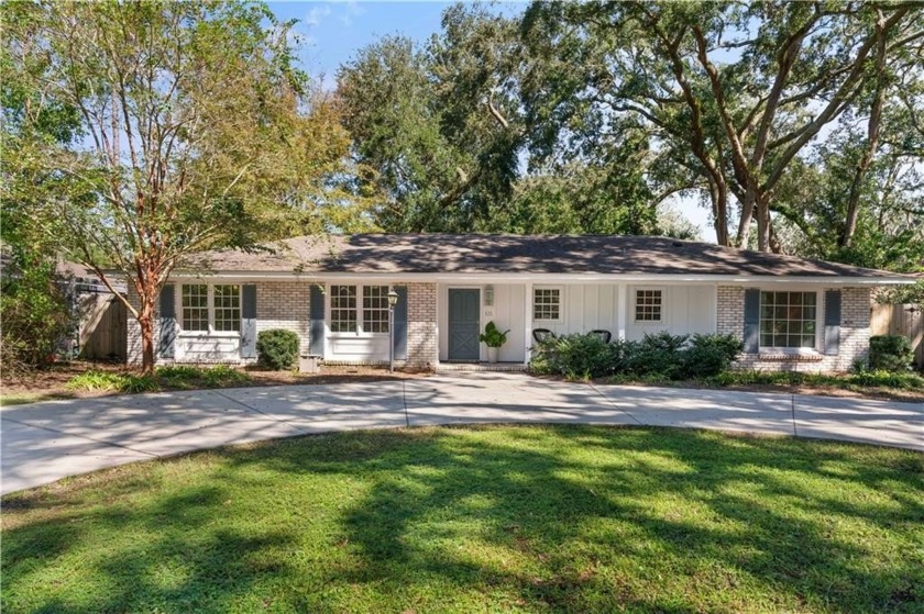 Welcome to this delightful 3-bedroom, 2-bath ranch-style home - Beach Home for sale in Saint Simons, Georgia on Beachhouse.com