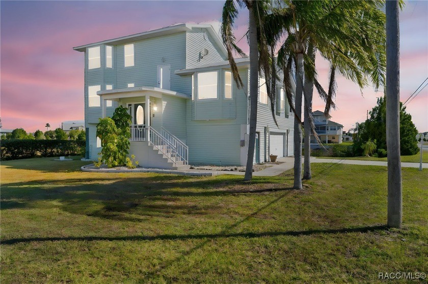 Enjoy the coastal lifestyle in this 3-level waterfront home - Beach Home for sale in Hernando Beach, Florida on Beachhouse.com