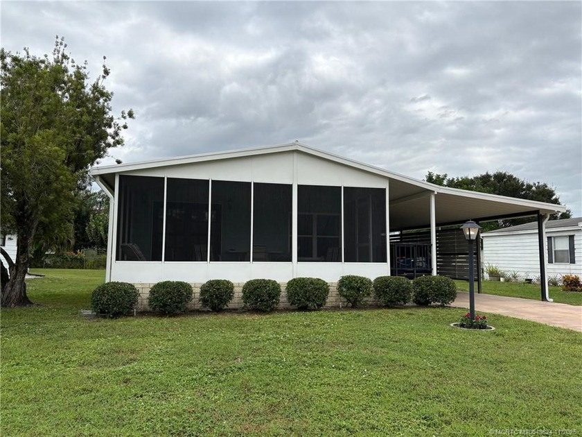 EASY LIVING IN THIS ACTIVE COMMUNITY WITH 2 POOLS, 2 CLUBHOUSES - Beach Home for sale in Stuart, Florida on Beachhouse.com