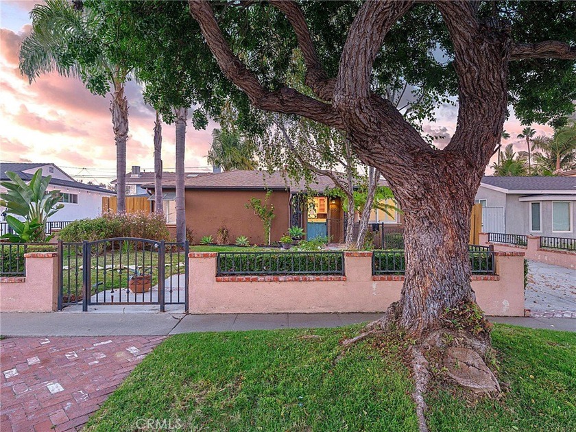 Nestled behind a charming fenced front yard boasting custom - Beach Home for sale in Redondo Beach, California on Beachhouse.com