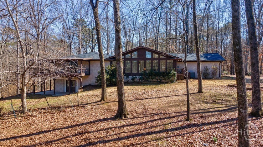 Nestled on over 10 private acres in desirable Watkinsville, this - Beach Home for sale in Watkinsville, Georgia on Beachhouse.com