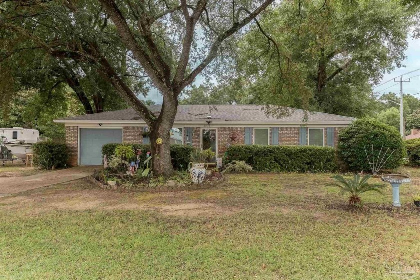 This charming 3-bedroom, 2-bathroom brick home in northeast - Beach Home for sale in Pensacola, Florida on Beachhouse.com