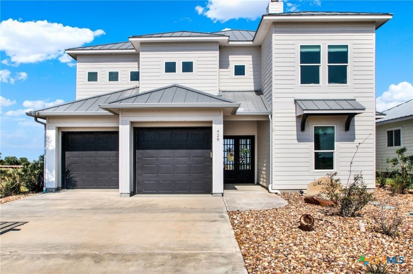 This exquisite two-story home, set on a picturesque one-acre lot - Beach Home for sale in Seadrift, Texas on Beachhouse.com